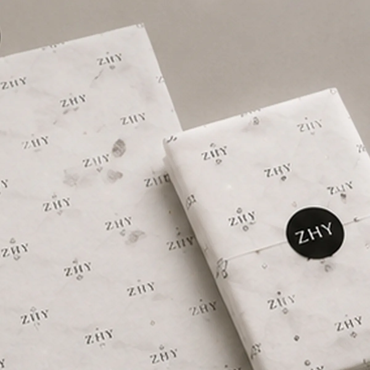 Custom printed tissue paper with repeating brand pattern