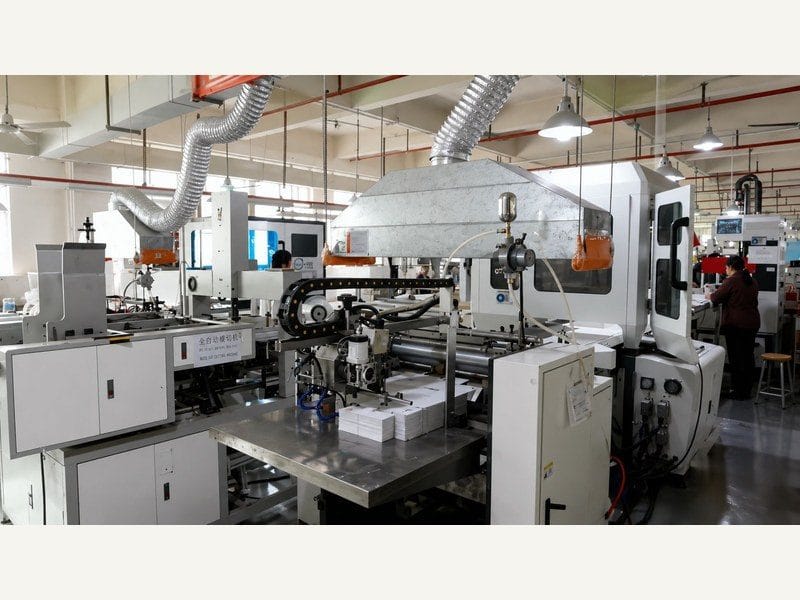 Folding and gluing production line at ZHY Packing