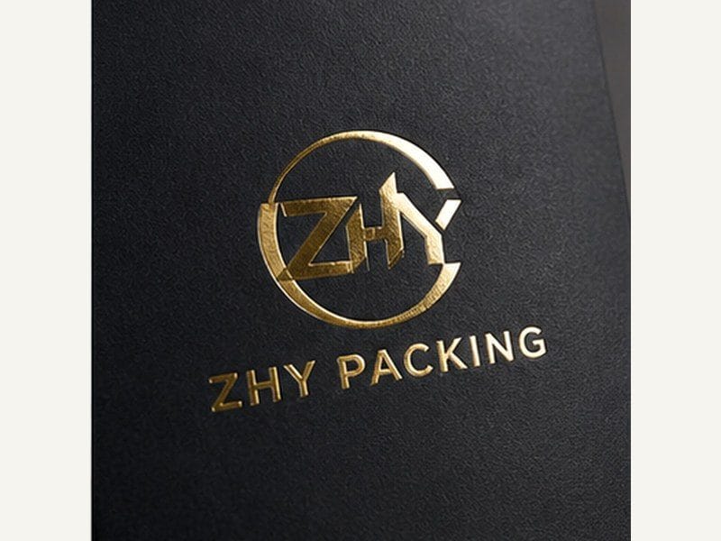 Close view of hot foil stamping on a black paper box